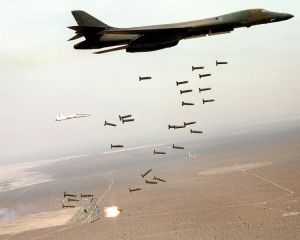 A US Air Force bomber drops cluster munitions during a training exercise.