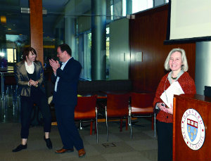 From left: Amelia Evans, LLM '11, Tyler Giannini, and Dean Martha Minow, celebrating the launch of the Institute for Multi-Stakeholder Integrity.