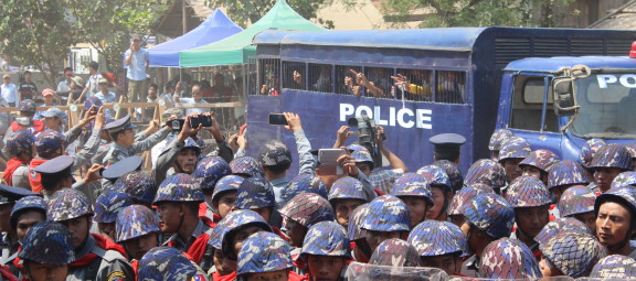Police transport detained protesters to Thayawaddy Prison in a police truck, March 10, 2015. ©2015 La Pyae.