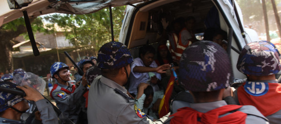 Police open the door of an ambulance containing sick or injured protesters at Letpadan, March 10, 2015. Eyewitnesses described seeing police officers drag protesters out of the ambulance and beat them. ©2015 Sai Zaw/The Irrawaddy.