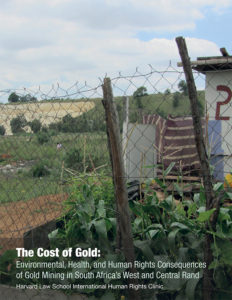 Report cover shows fencing in front of a dilapidated house and what looks to be the South African landscape.
