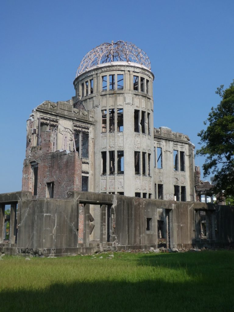 A concrete stone dome that barely stands in the residual effects of the Atomic Bomb in Hiroshima.