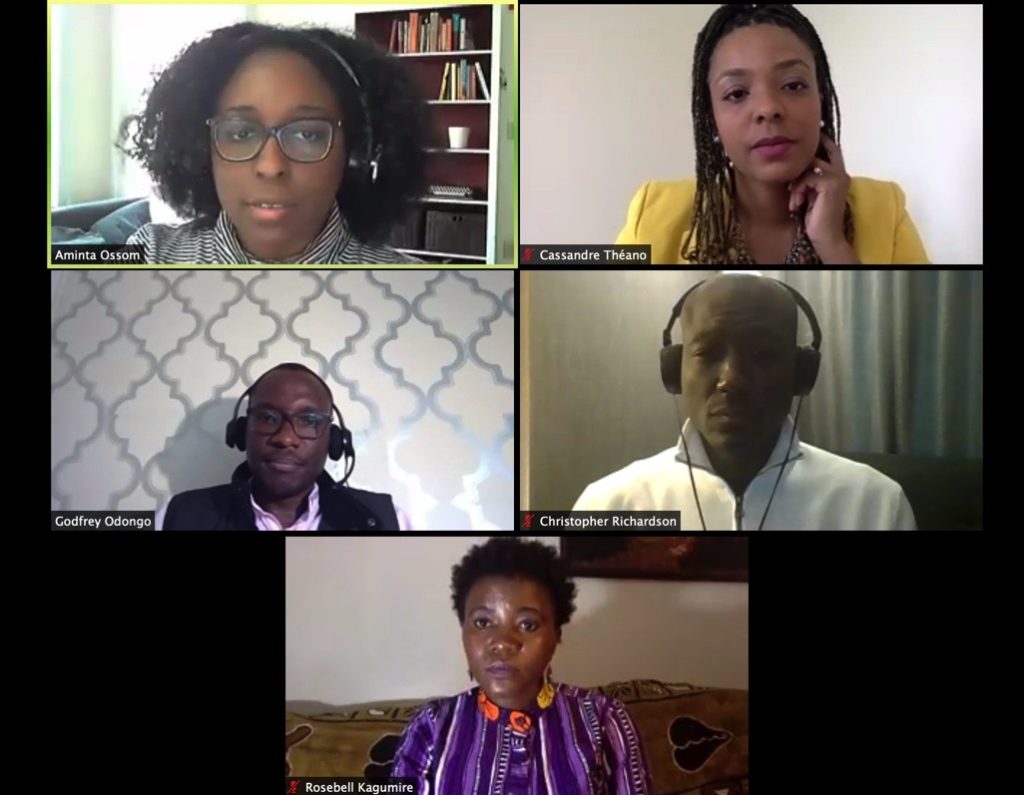 Five Black individuals talk on zoom in a grid pattern. Three are women and two are men. The person speaking has a light green box around her image.
