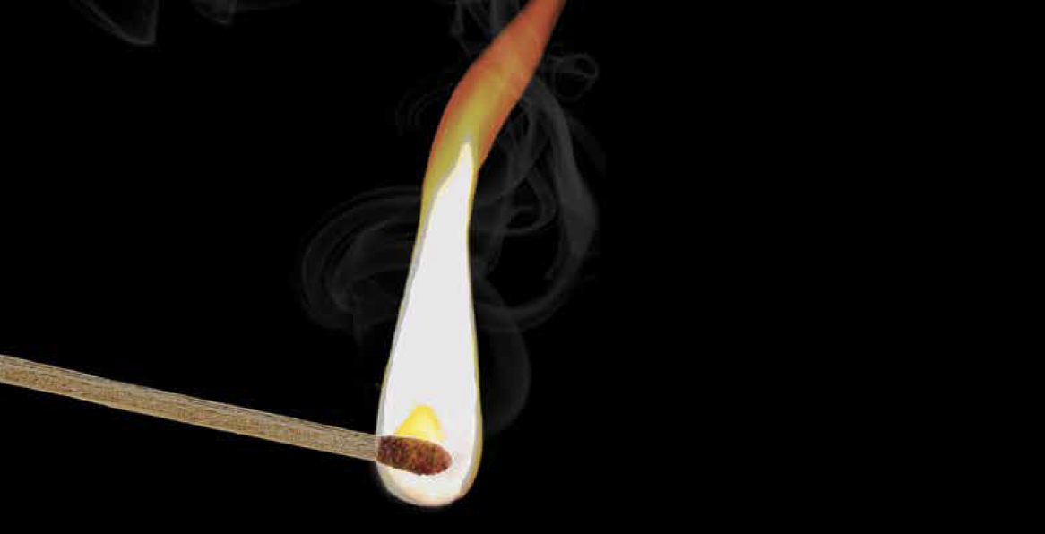 A match burns against a black background